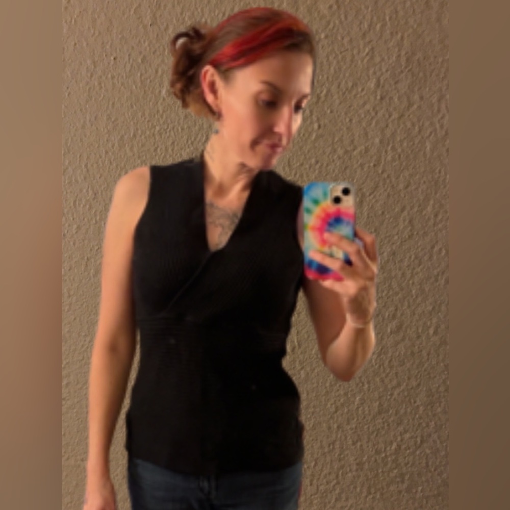 August silk knitted tank style shirt.